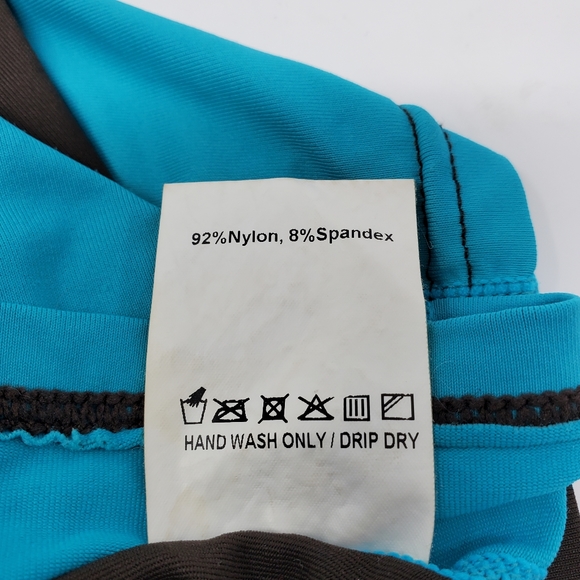 O'NEILL BROWN AND TEAL SHORT SLEEVE RASH GUARD SIZE SMALL - Picture 10 of 12